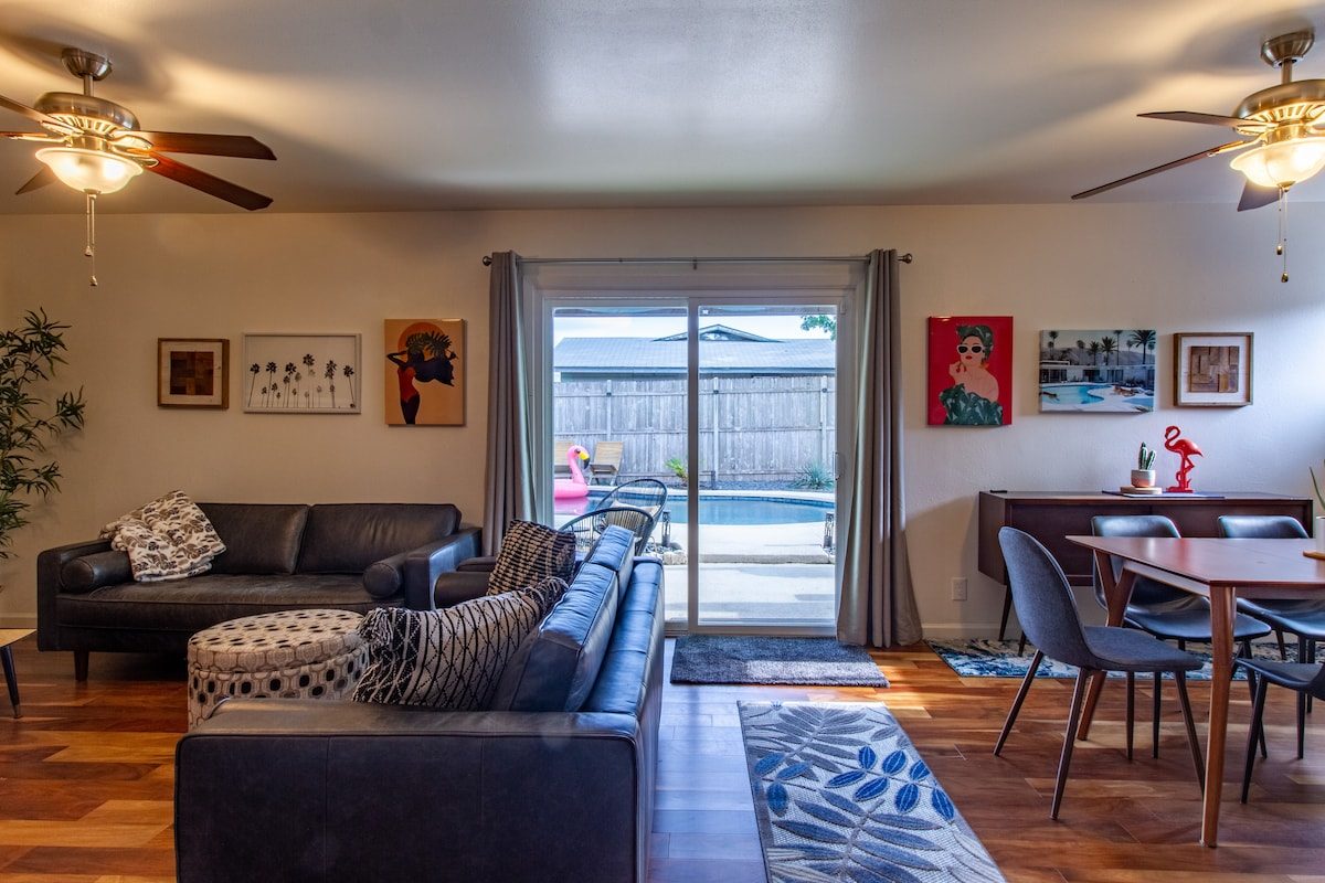 Family room and dining open to backyard and pool